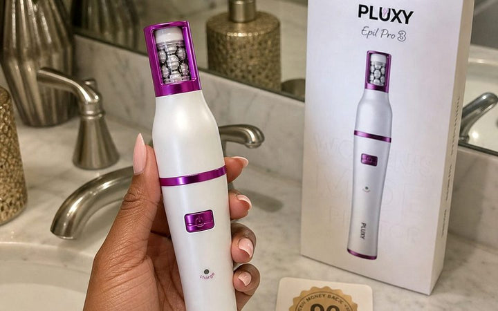 Pluxy held in a bathroom routine with box and guarantee card